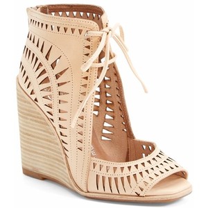 The laser cut on these Jeffrey Campbell Rodeo wedges is a fabulous detail